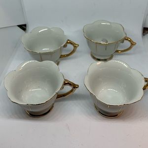 Four small porcelain espresso cups antiques